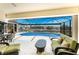 Covered outdoor patio features a pool overlooking a serene canal and waterfront views at 1134 Coronado Dr, Punta Gorda, FL 33950