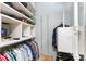 Organized walk-in closet with shelving and hanging storage for clothes and accessories at 1134 Coronado Dr, Punta Gorda, FL 33950