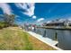 Beautiful canal view with boat dock and boats ready for the water at 1134 Coronado Dr, Punta Gorda, FL 33950