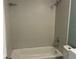 Bathroom featuring modern vanity, updated fixtures, and tiled shower at 1258 Barbara Dr # 202, Venice, FL 34285