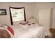 Bedroom with a queen bed, and matching dresser at 1295 Saxony Cir # 2101, Punta Gorda, FL 33983