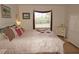 Comfortable bedroom featuring ample natural light and a queen size bed at 1295 Saxony Cir # 2101, Punta Gorda, FL 33983