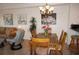 Dining area with stylish decor open to the living space at 1295 Saxony Cir # 2101, Punta Gorda, FL 33983