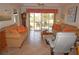 Open living room with comfortable seating, view of the outdoor patio at 1295 Saxony Cir # 2101, Punta Gorda, FL 33983