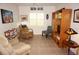 Comfortable living room featuring plenty of seating and natural light at 1295 Saxony Cir # 2101, Punta Gorda, FL 33983