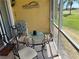 Comfortable outdoor patio with furniture and scenic views at 1295 Saxony Cir # 2101, Punta Gorda, FL 33983