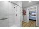 Luxurious bathroom with tiled shower, glass door, and walk-in closet at 1318 Wesley Dr # 7, Punta Gorda, FL 33950