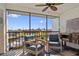 This inviting screened lanai provides a scenic view of the canal and boat docks for relaxing at 1318 Wesley Dr # 7, Punta Gorda, FL 33950