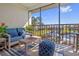 Relaxing screened lanai with comfortable seating overlooking the canal and boat docks at 1318 Wesley Dr # 7, Punta Gorda, FL 33950