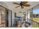 Enjoy Florida breezes on this screened lanai complete with a dining area and comfortable seating at 1318 Wesley Dr # 7, Punta Gorda, FL 33950