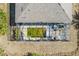 Birds eye view of a property with a screened in pool at 15345 Pottstown Ave, Port Charlotte, FL 33981