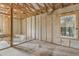 Unfinished bathroom area showcases block walls, framing, and rough-in plumbing, ready for your design vision at 15345 Pottstown Ave, Port Charlotte, FL 33981