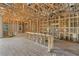 Spacious living room showcasing wooden framing, exposed ceilings, and lots of natural light, ready for customization at 15345 Pottstown Ave, Port Charlotte, FL 33981