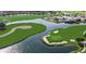 Aerial view of a golf course community with scenic water features and lush green fairways at 1673 Palace Ct, Punta Gorda, FL 33980