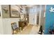The entryway features wainscoting, a patterned rug, tile floors, and neutral colors at 1673 Palace Ct, Punta Gorda, FL 33980