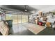 Spacious garage with an open door and extra storage featuring a painted floor and a rug at 1673 Palace Ct, Punta Gorda, FL 33980