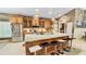Well-appointed kitchen with a large island, stainless steel appliances, and stylish pendant lighting at 1673 Palace Ct, Punta Gorda, FL 33980