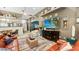 The spacious living room has unique coastal decor, comfortable seating, and lots of natural light at 1673 Palace Ct, Punta Gorda, FL 33980