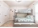 bedroom with bunk beds and a pull out trundle at 1690 Yakutat Rd, North Port, FL 34287