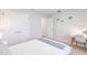 Inviting bedroom with white accents and a desk, creating a relaxing retreat with a turtle theme at 1690 Yakutat Rd, North Port, FL 34287