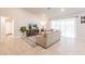 Bright and airy living room with comfortable seating, a TV, and access to the dining area at 1690 Yakutat Rd, North Port, FL 34287