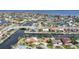 Aerial view of a desirable waterfront community with canals, bridges, and easy access to open water at 1796 Boca Raton Ct, Punta Gorda, FL 33950