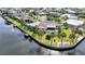 Aerial view of waterfront community featuring homes along canals, offering scenic waterfront living at 1796 Boca Raton Ct, Punta Gorda, FL 33950