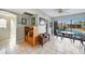 Bright dining area with tile floors, a pool view, and access to the outdoor patio for entertaining at 1796 Boca Raton Ct, Punta Gorda, FL 33950