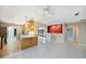Open kitchen layout with adjacent dining and living areas at 1796 Boca Raton Ct, Punta Gorda, FL 33950
