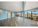 Bright living room with tile floors, recessed lighting, and many windows at 1796 Boca Raton Ct, Punta Gorda, FL 33950