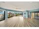 Bright living room boasts tile floors and water views from the many windows at 1796 Boca Raton Ct, Punta Gorda, FL 33950