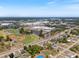 Aerial view of the property's location within a vibrant neighborhood near schools and shopping centers at 18151 Cochran Blvd, Port Charlotte, FL 33948