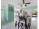 Open layout dining and kitchen area offering a seamless flow and stylish design at 18151 Cochran Blvd, Port Charlotte, FL 33948