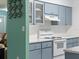 Close up of the kitchen featuring ample cabinet space, modern appliances, and decorative accents at 18151 Cochran Blvd, Port Charlotte, FL 33948
