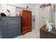 Bright laundry area featuring cabinets and drawers for additional storage space at 18151 Cochran Blvd, Port Charlotte, FL 33948