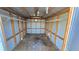 Interior of shed featuring wood framework, flooring, shelving, and a vent for ventilation and organization at 18519 Alphonse Cir, Port Charlotte, FL 33948