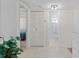 Hallway leading to the bedroom and bathroom, offering convenient access to all areas of the home at 19505 Quesada Ave # Pp201, Port Charlotte, FL 33948