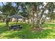 Relaxing shady picnic area with charcoal grill for resident enjoyment in this community at 19505 Quesada Ave # Pp201, Port Charlotte, FL 33948