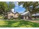 Community clubhouse with pool and ample greenery at 19505 Quesada Ave # Pp201, Port Charlotte, FL 33948