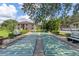 Community shuffleboard courts with building in background at 19505 Quesada Ave # Pp201, Port Charlotte, FL 33948