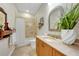 Bright bathroom featuring a tub, shower, and vanity with lots of counter space and storage at 196 Tarpon Cove Blvd # 722, Punta Gorda, FL 33950