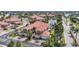 Stunning waterfront villa with a red tile roof, lush landscaping, and a three-car garage at 196 Tarpon Cove Blvd # 722, Punta Gorda, FL 33950