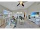 Cozy living room featuring tile flooring, recessed lighting, and stylish furniture at 196 Tarpon Cove Blvd # 722, Punta Gorda, FL 33950