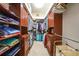 Spacious walk-in closet with custom shelving and ample storage for clothes and accessories at 196 Tarpon Cove Blvd # 722, Punta Gorda, FL 33950