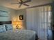 Bedroom with natural light, comfy queen bed and blinds at 21405 Olean Blvd # 531, Port Charlotte, FL 33952