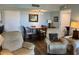 Living room featuring a dining area, comfortable seating, and wood floors at 21405 Olean Blvd # 531, Port Charlotte, FL 33952