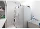 Laundry room with washer, dryer, sink, and plenty of shelving space at 25179 Campos Dr, Punta Gorda, FL 33983