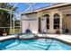Beautiful screened-in pool and hot tub, offering a private outdoor relaxation space at 25179 Campos Dr, Punta Gorda, FL 33983