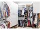 A well-organized walk-in closet with ample storage space and custom shelving at 25179 Campos Dr, Punta Gorda, FL 33983