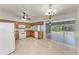 Fully equipped kitchen featuring stainless steel appliances with a view into the living room at 309 Aurora St, Port Charlotte, FL 33948